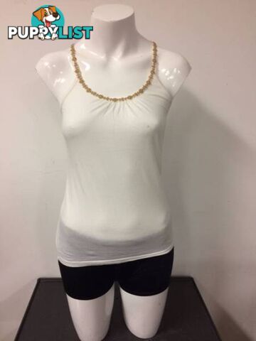 white top with gold lace