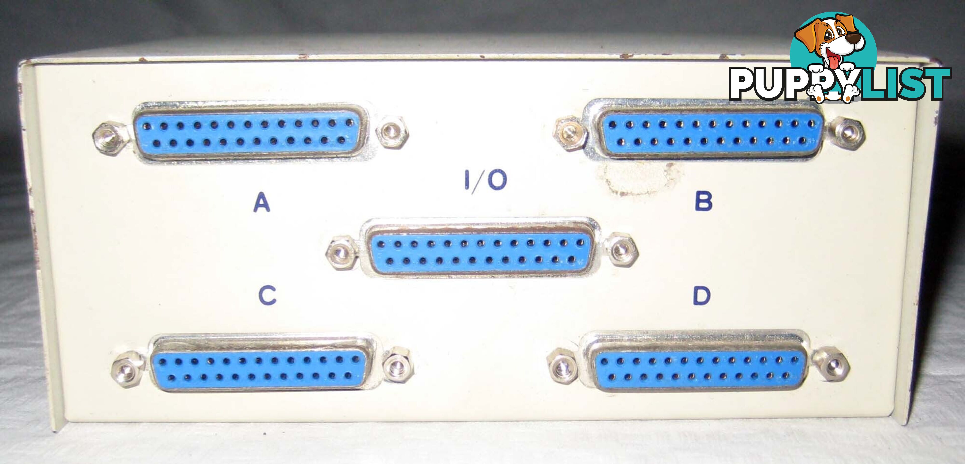 vintage data transfer switch box with 4 x DB25 ports for Commodore computers