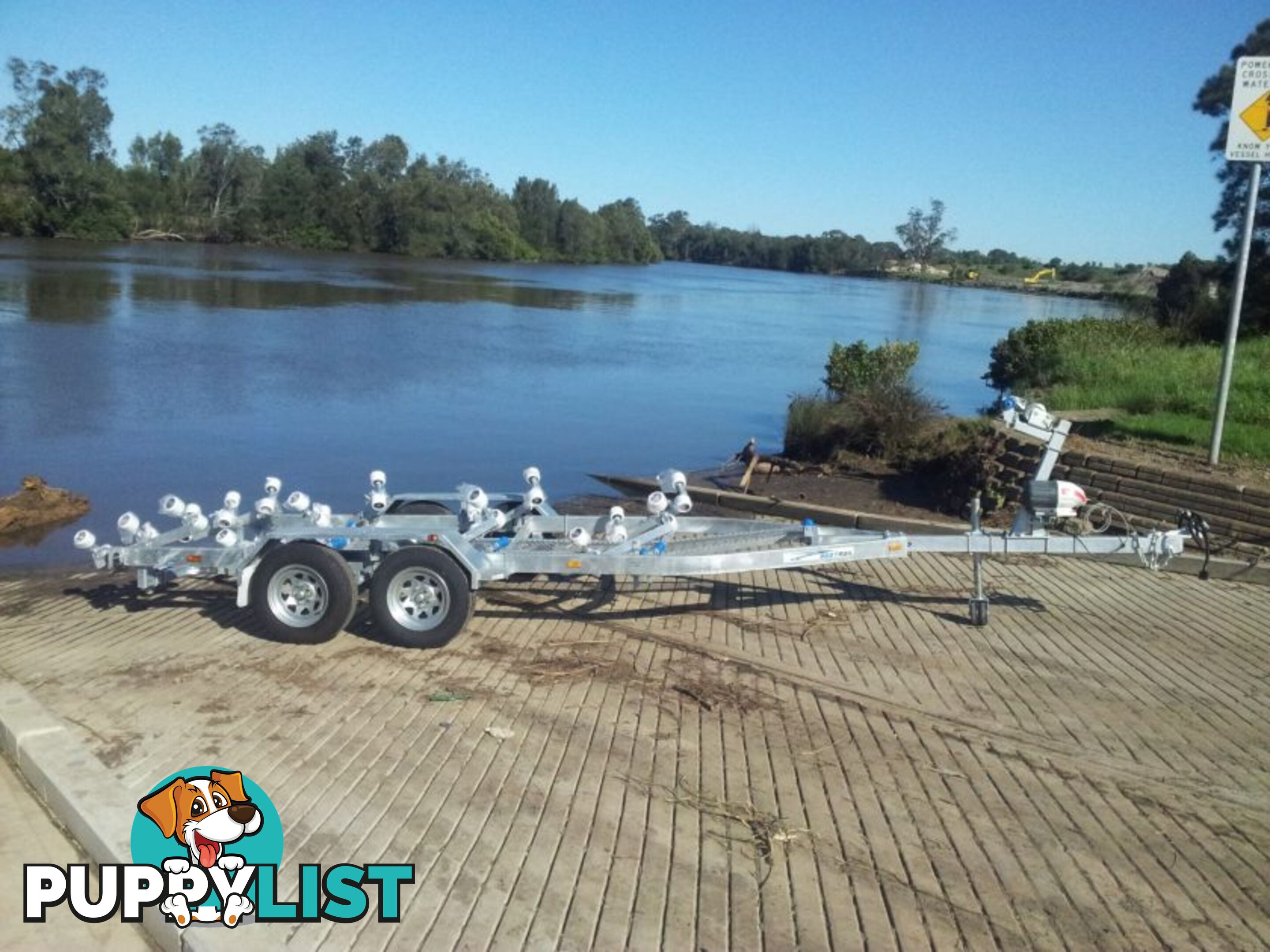 GAL BOAT TRAILER SUITS UP TO A 6.7 mt FIBERGLASS HULL TANDEM AXLE TARE 610 kg ATM 2800 kg HYD BRAKED