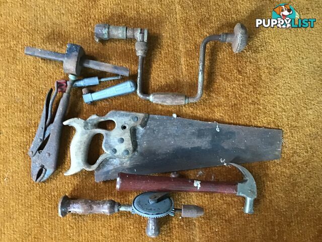 A GROUP OF OLD HANDYMANS TOOLS