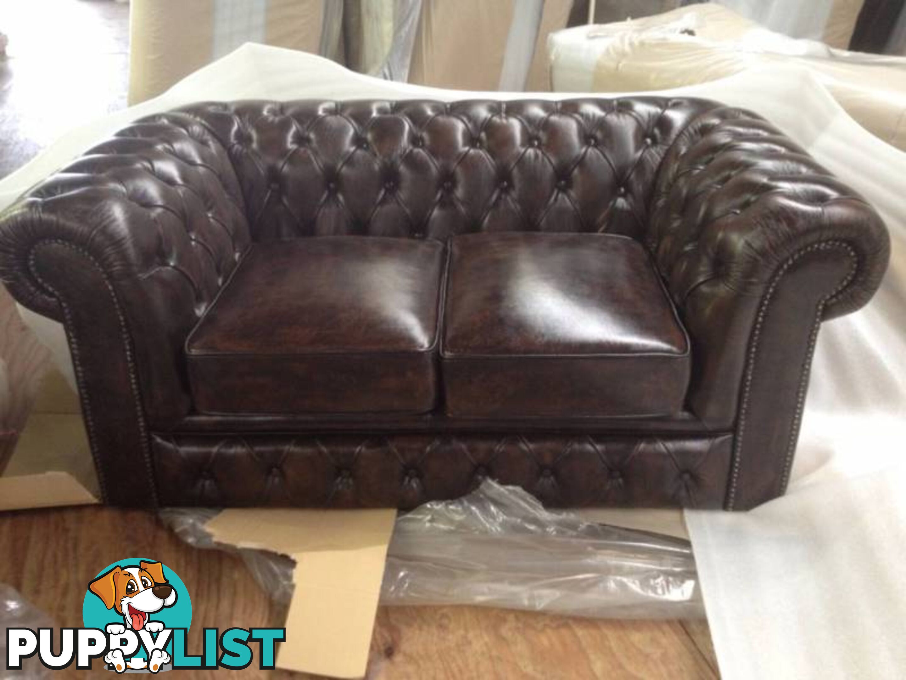 LOUNGE NEW CHESTERFIELD 100% COW LEATHER. RENT KEEP $25.30 PW