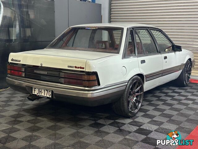 1986 HOLDEN COMMODORE SL VL 4D SEDAN