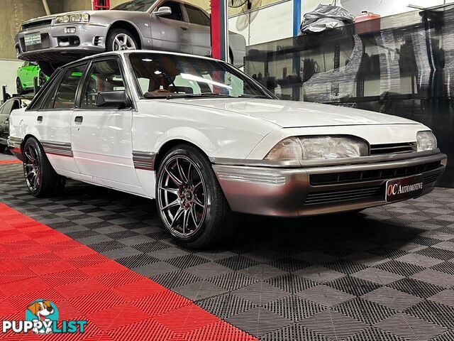 1986 HOLDEN COMMODORE SL VL 4D SEDAN