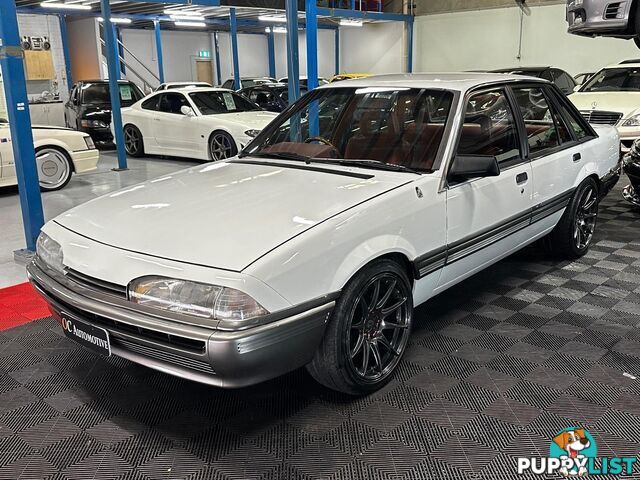 1986 HOLDEN COMMODORE SL VL 4D SEDAN