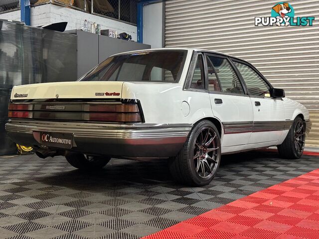 1986 HOLDEN COMMODORE SL VL 4D SEDAN