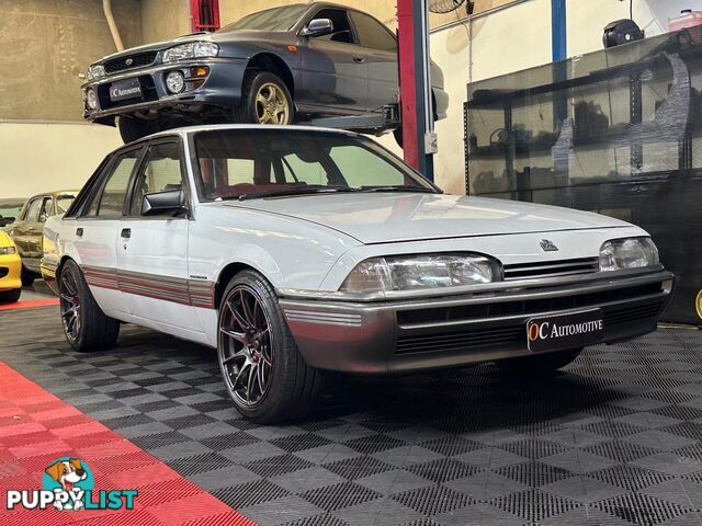 1986 HOLDEN COMMODORE SL VL 4D SEDAN