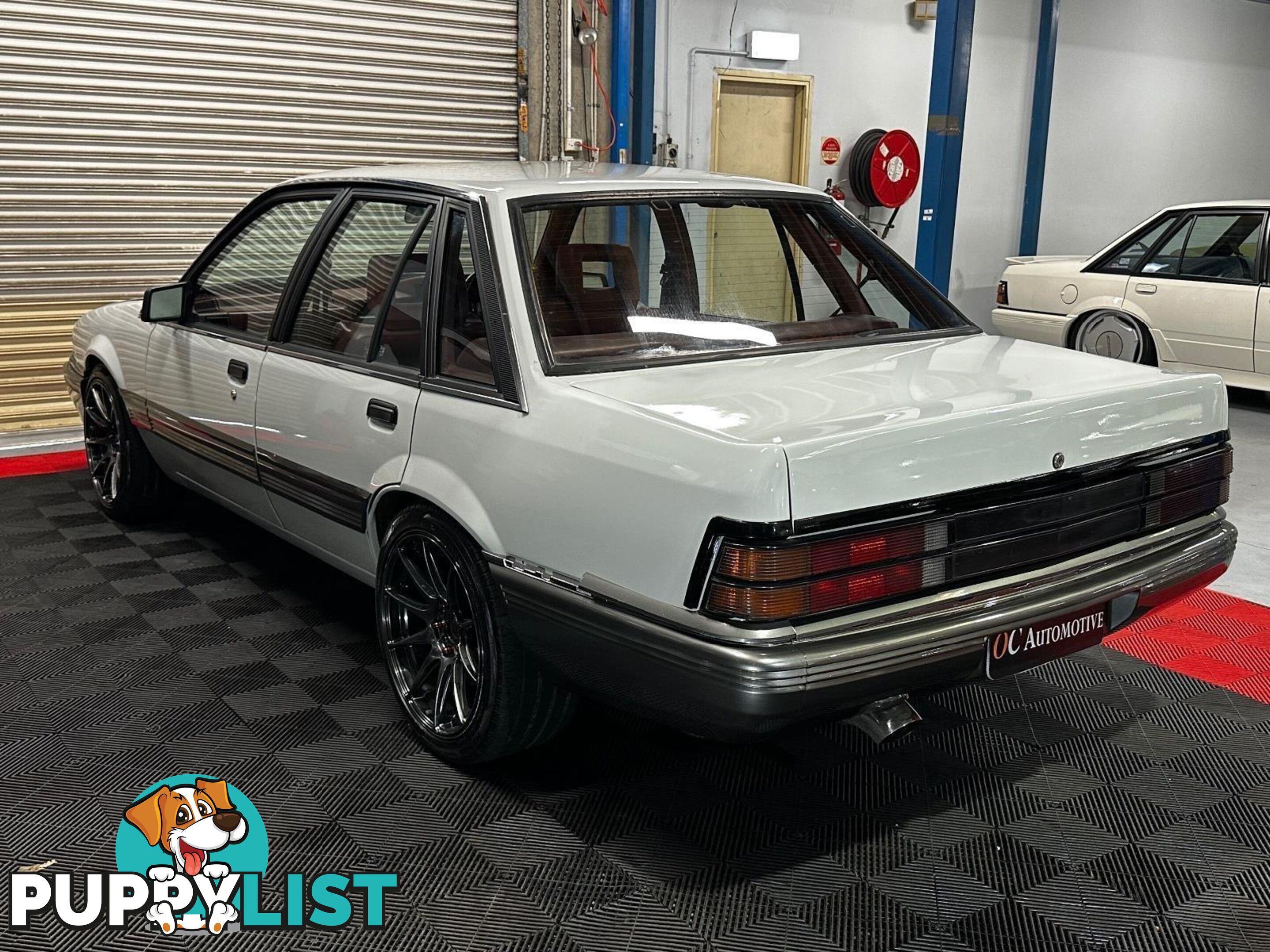 1986 HOLDEN COMMODORE SL VL 4D SEDAN