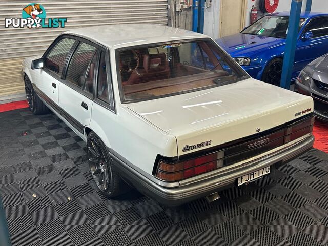 1986 HOLDEN COMMODORE SL VL 4D SEDAN