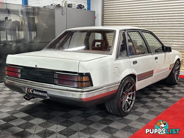 1986 HOLDEN COMMODORE SL VL 4D SEDAN