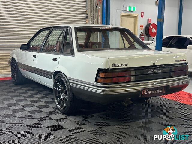 1986 HOLDEN COMMODORE SL VL 4D SEDAN