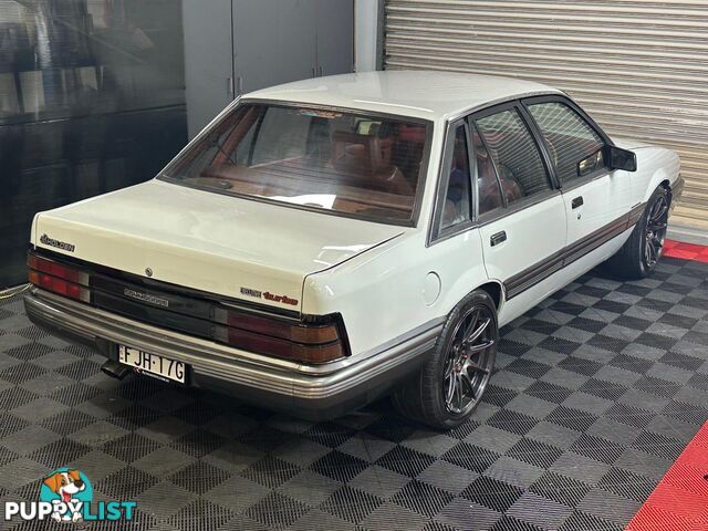 1986 HOLDEN COMMODORE SL VL 4D SEDAN