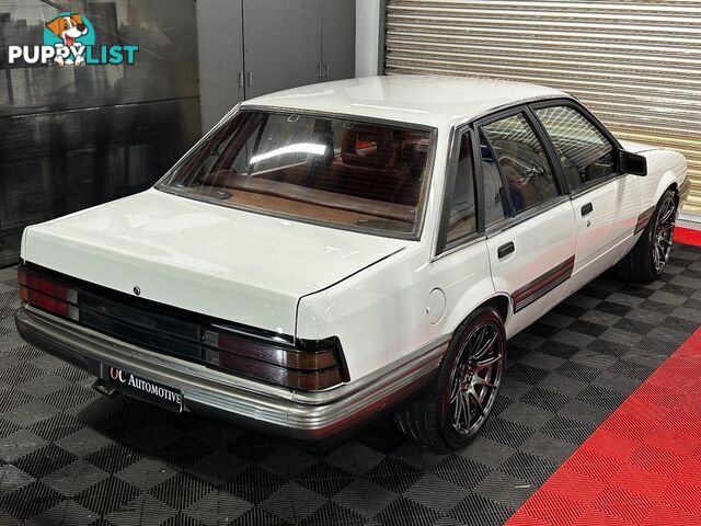 1986 HOLDEN COMMODORE SL VL 4D SEDAN