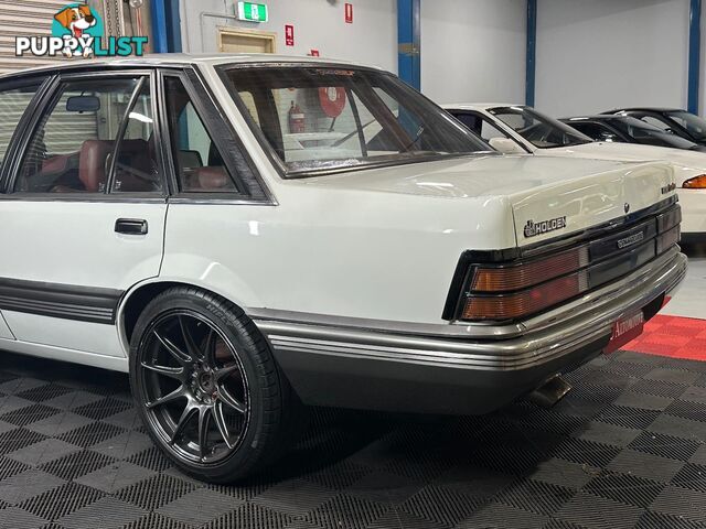 1986 HOLDEN COMMODORE SL VL 4D SEDAN