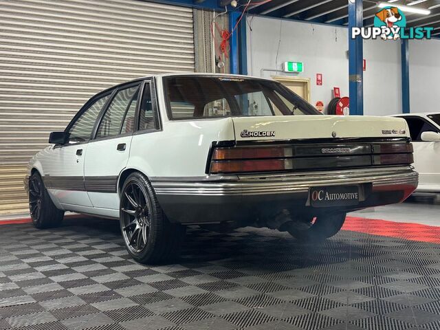 1986 HOLDEN COMMODORE SL VL 4D SEDAN