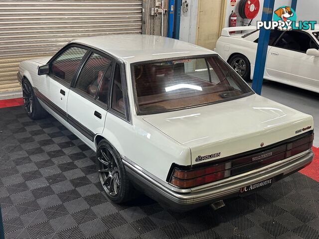 1986 HOLDEN COMMODORE SL VL 4D SEDAN