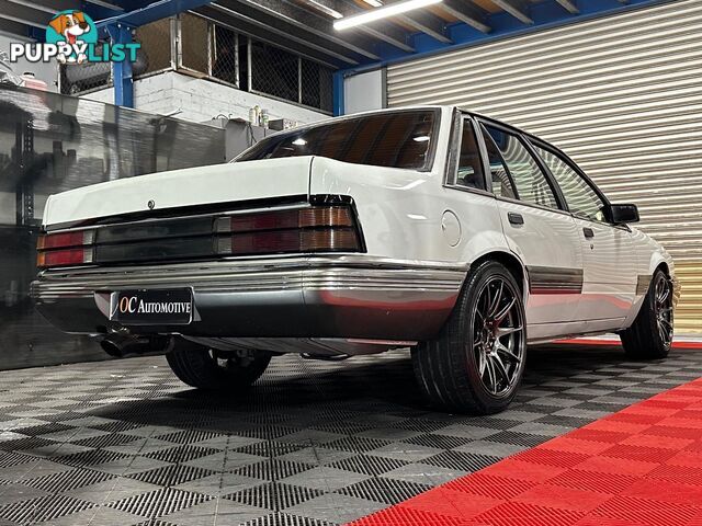 1986 HOLDEN COMMODORE SL VL 4D SEDAN