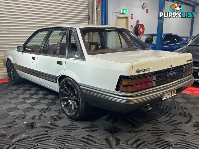 1986 HOLDEN COMMODORE SL VL 4D SEDAN