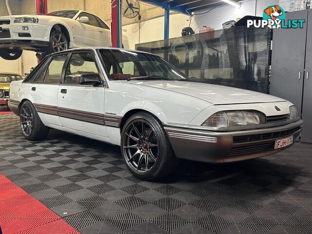 1986 HOLDEN COMMODORE SL VL 4D SEDAN