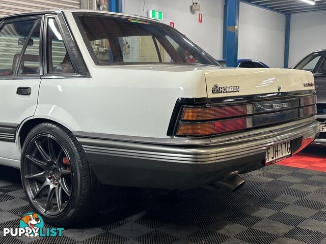 1986 HOLDEN COMMODORE SL VL 4D SEDAN