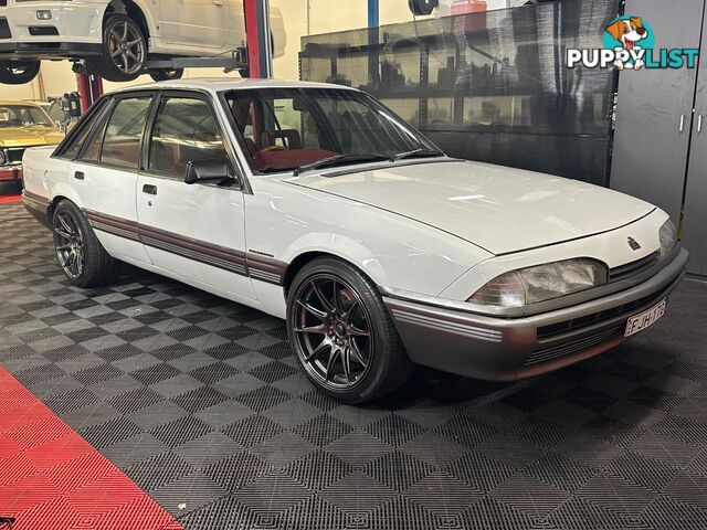 1986 HOLDEN COMMODORE SL VL 4D SEDAN