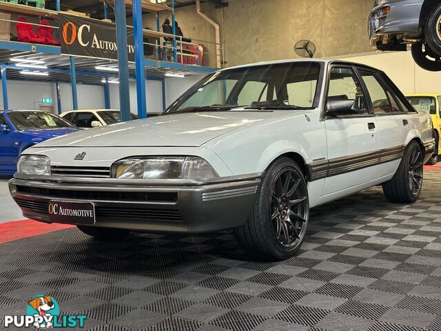 1986 HOLDEN COMMODORE SL VL 4D SEDAN