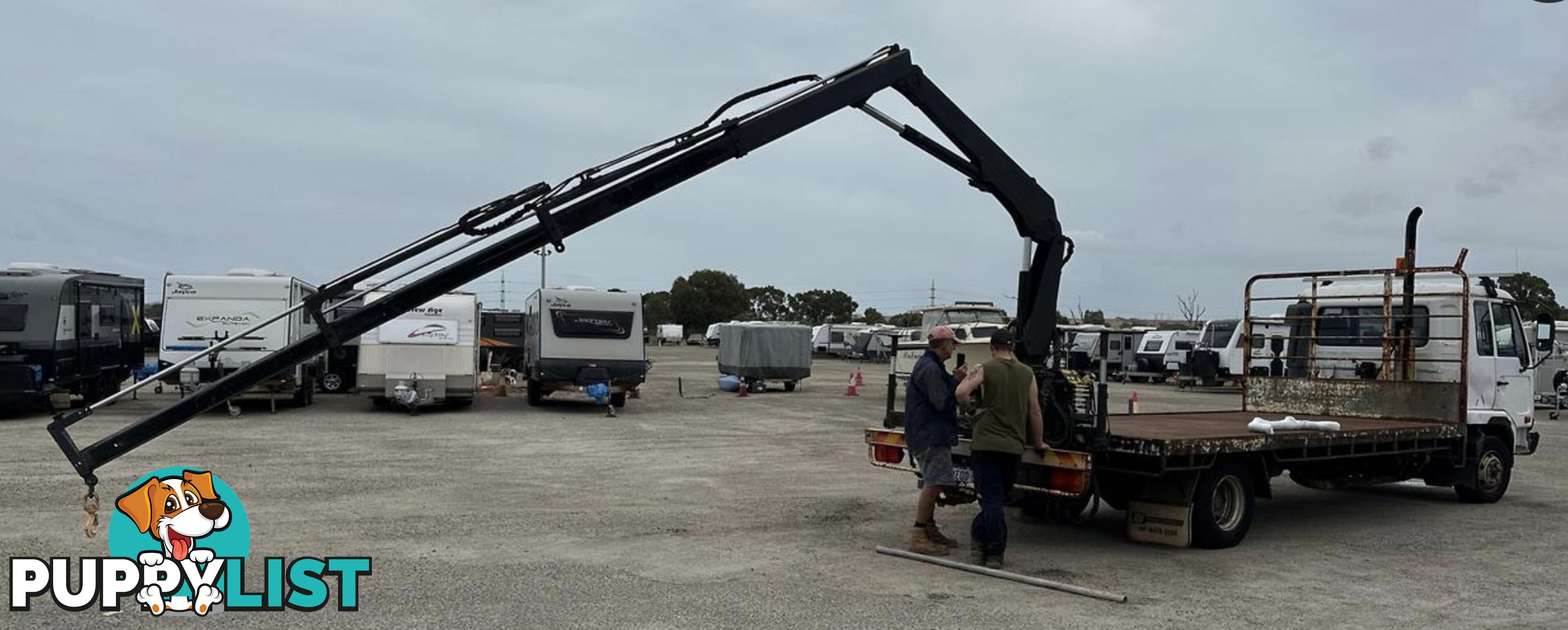 2007 Nissan UDFlat Deck Truck with Crane