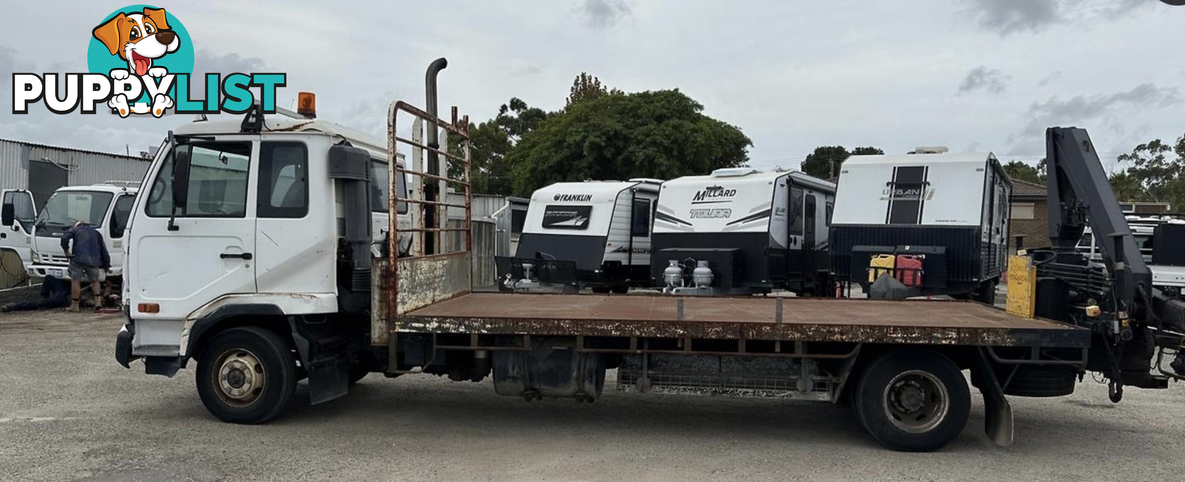 2007 Nissan UDFlat Deck Truck with Crane