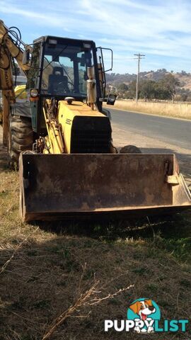 Ford 555 C back Hoe Loader Tractor number - A417110 Model- DE9P1Z