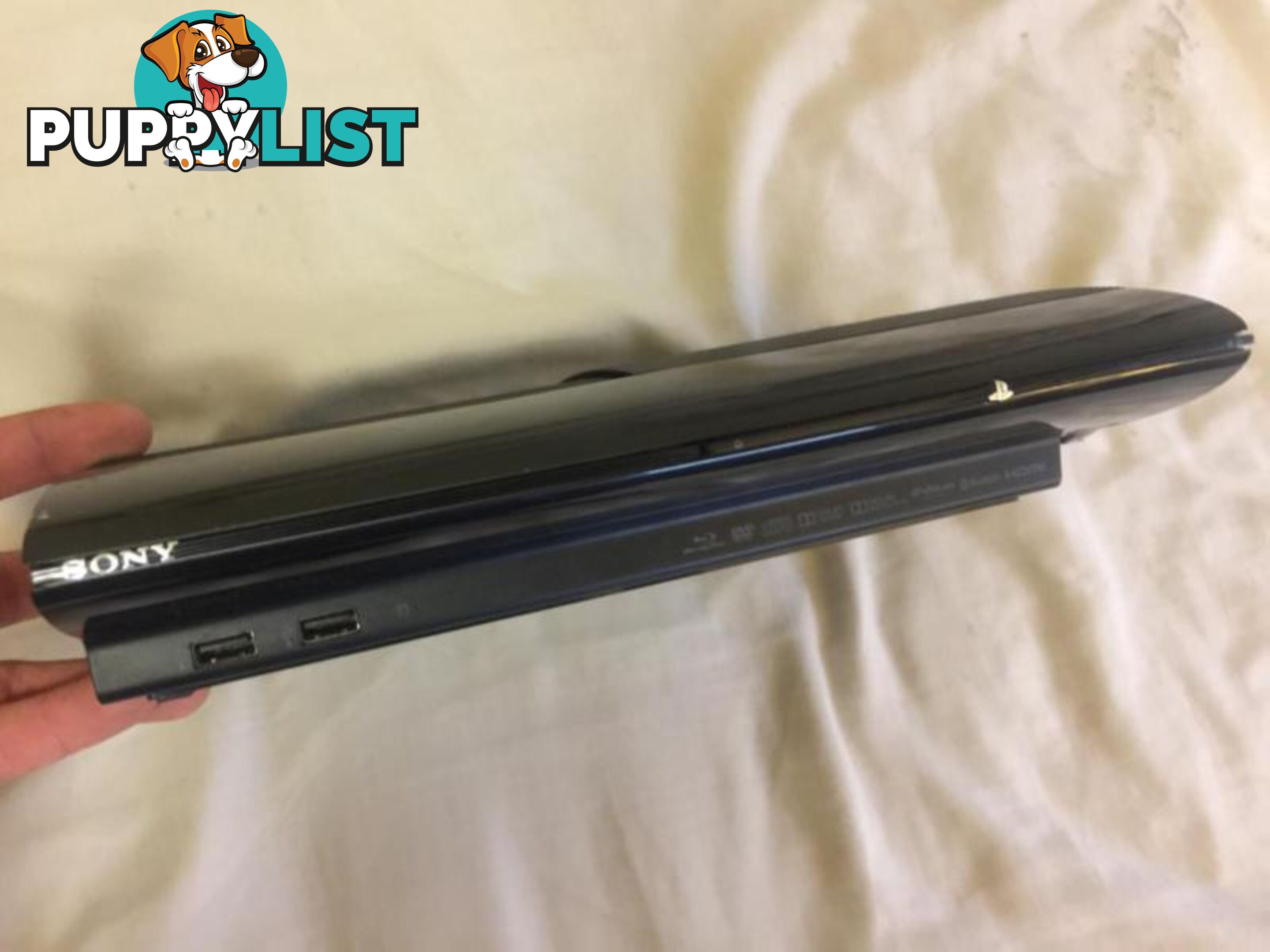 PS3 Super slim 500GB / 2 games / Controller