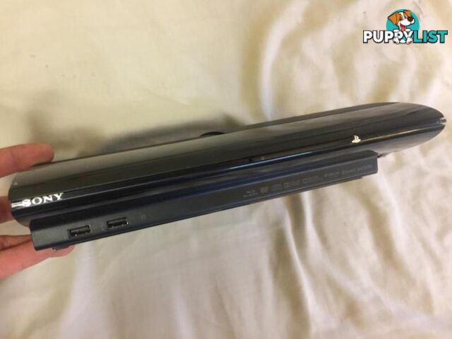 PS3 Super slim 500GB / 2 games / Controller