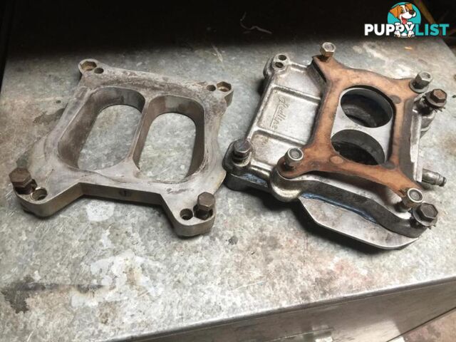 Carburettor spacer and adapter plates