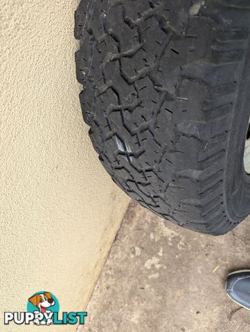 Three Off Road tyres and rims