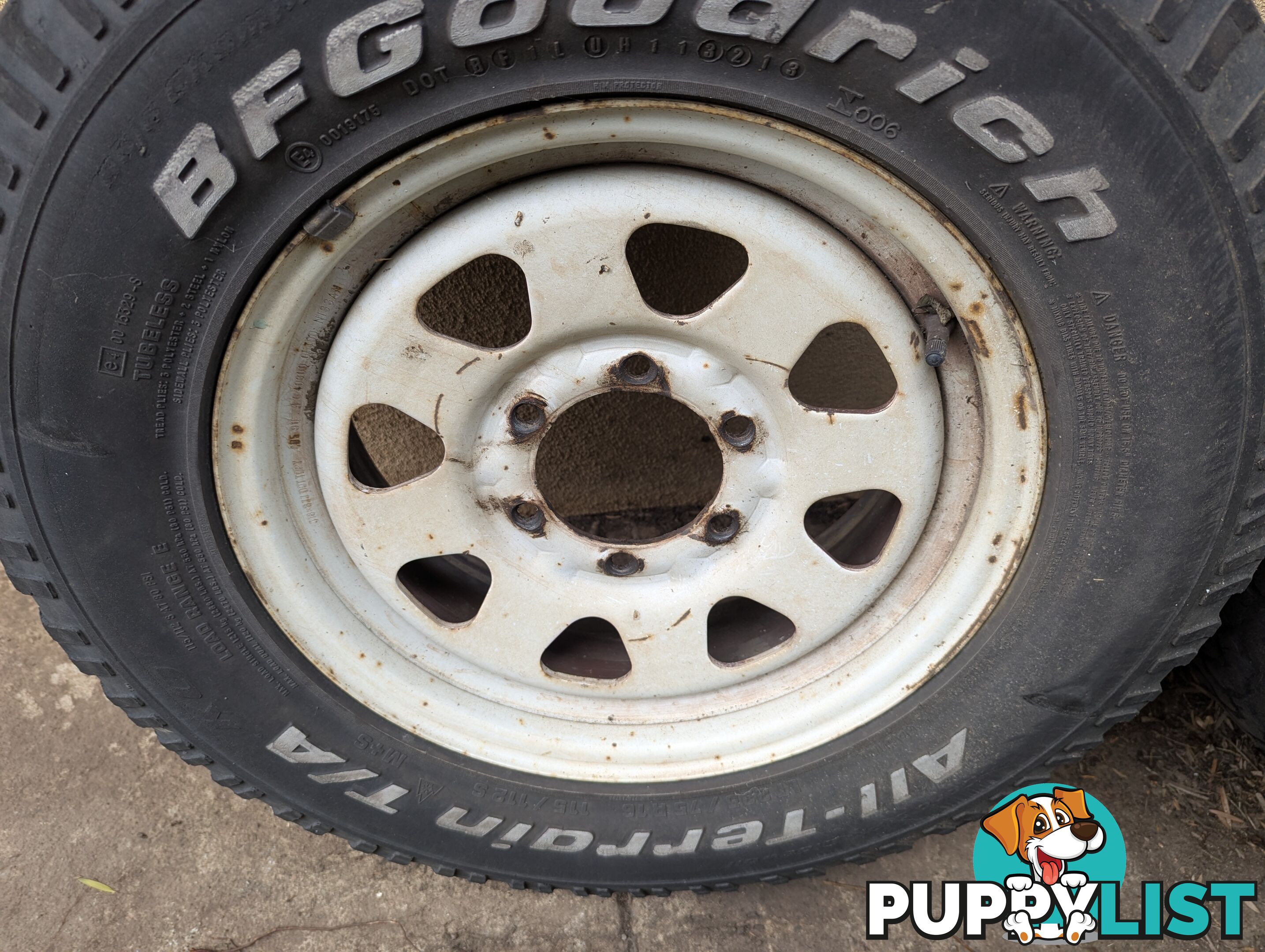 Three Off Road tyres and rims