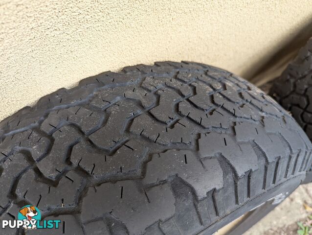 Three Off Road tyres and rims