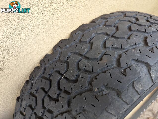 Three Off Road tyres and rims
