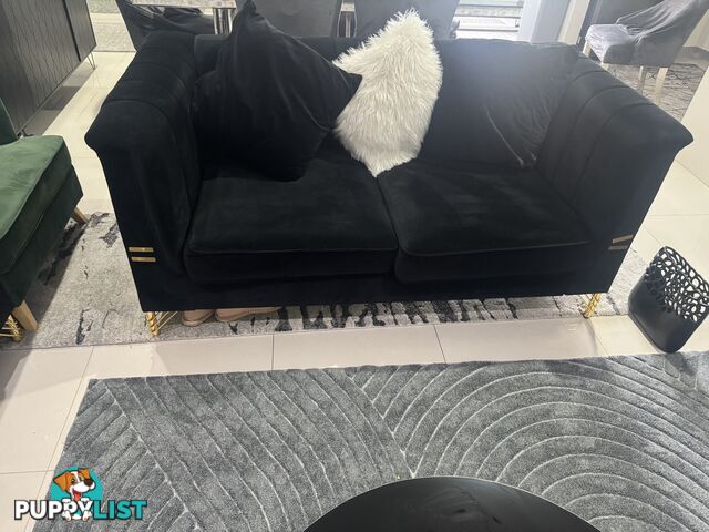 Black velevet  with gold leg lounge excellent condition less than 6 months old