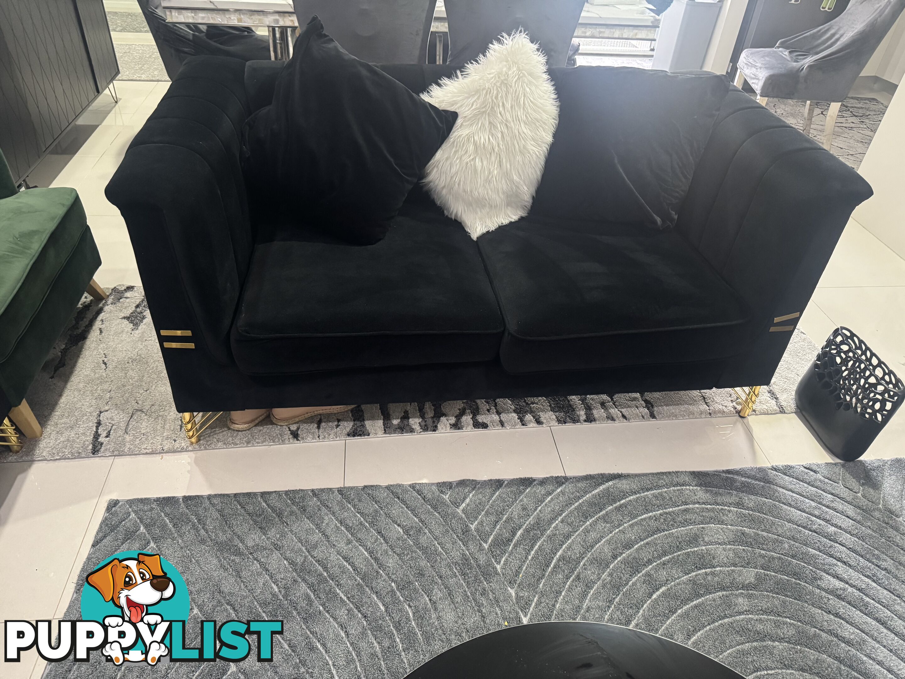 Black velevet  with gold leg lounge excellent condition less than 6 months old