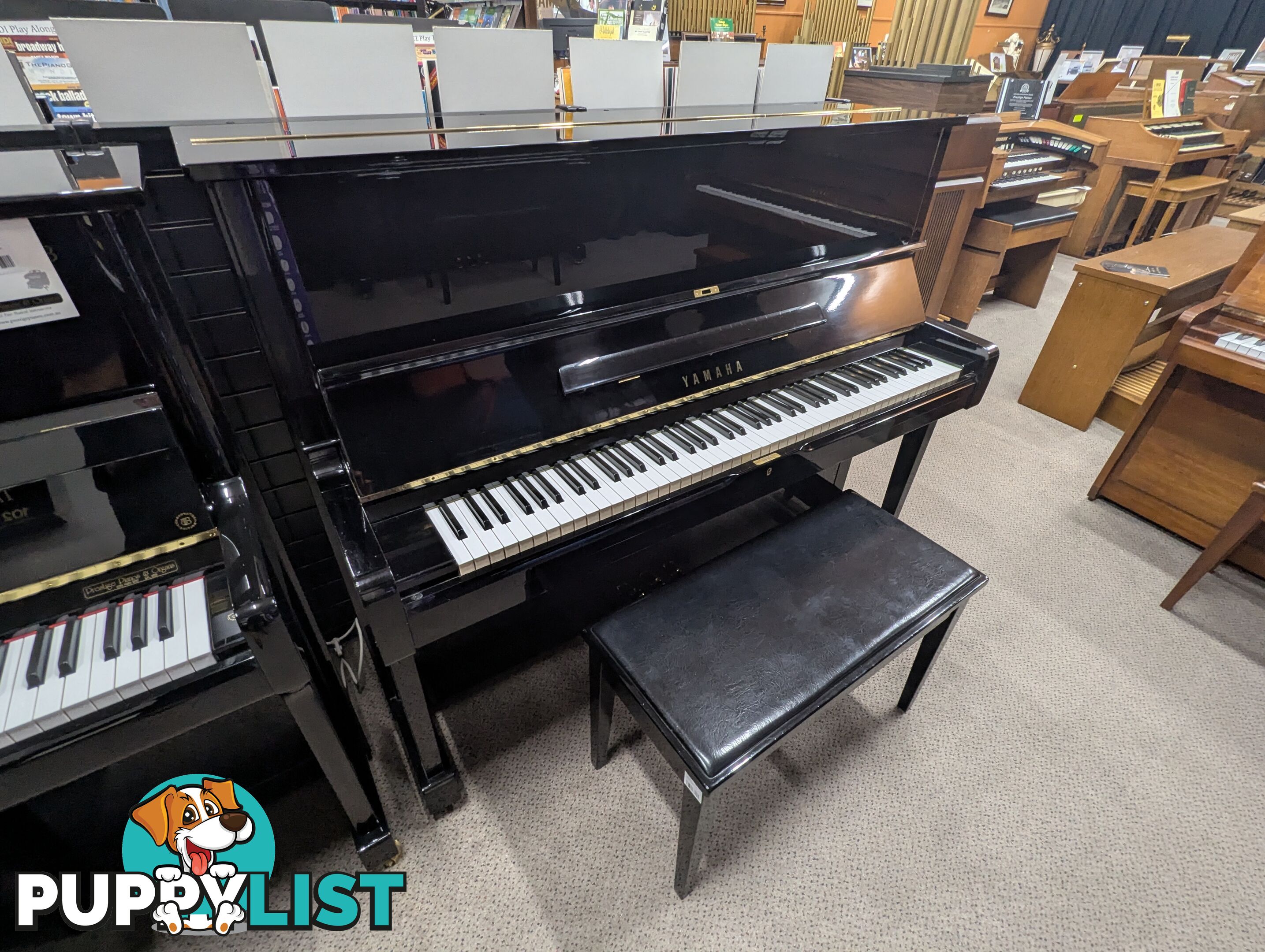 Yamaha U1H Polished Ebony Upright Piano in Excellent Condition