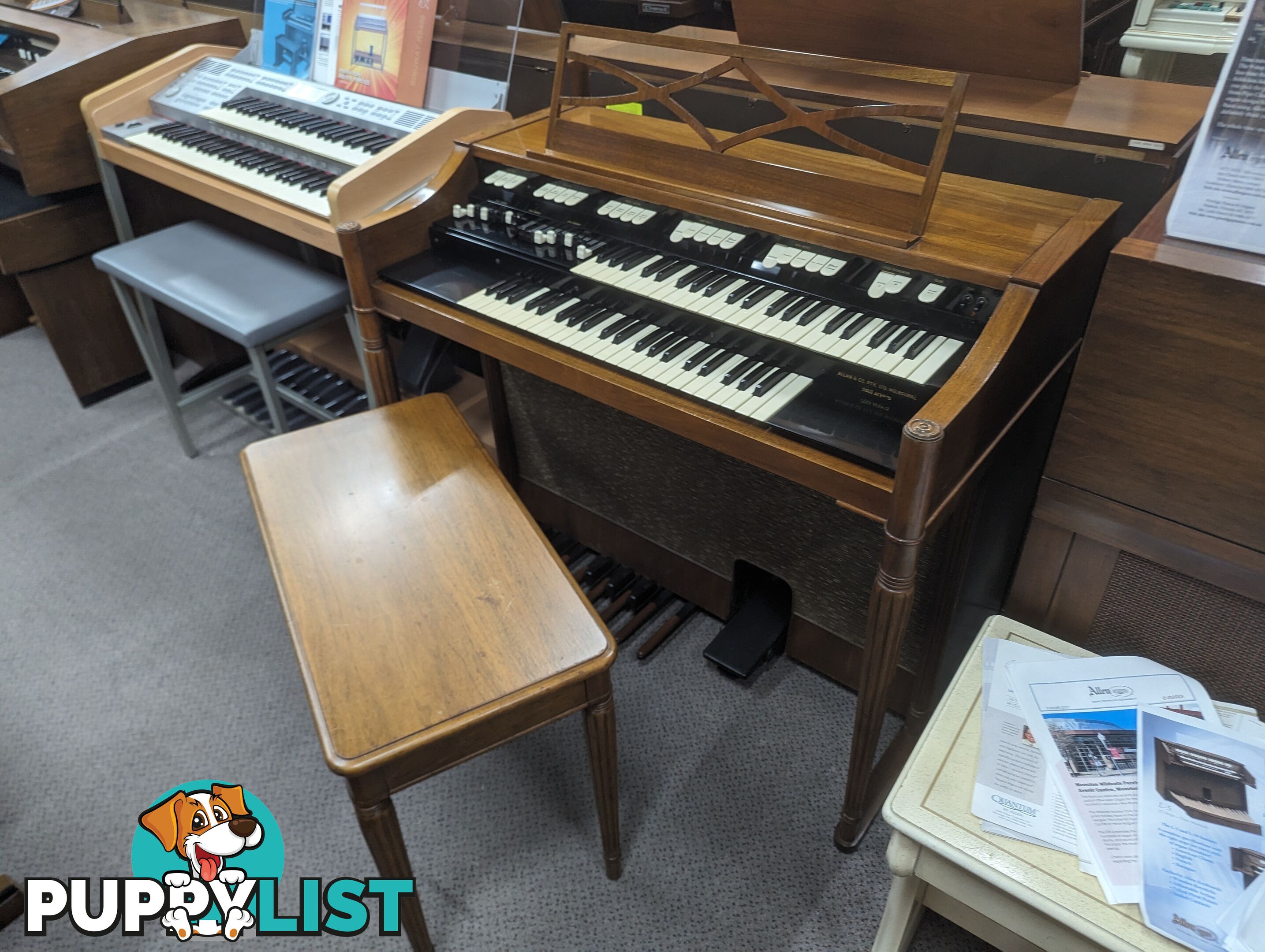 Hammond M100 Series Tone Wheel Organ - M-111, tradition style in walnut.