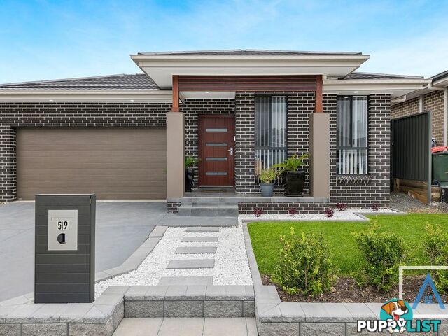 59 Arkley Avenue CLAYMORE NSW 2559