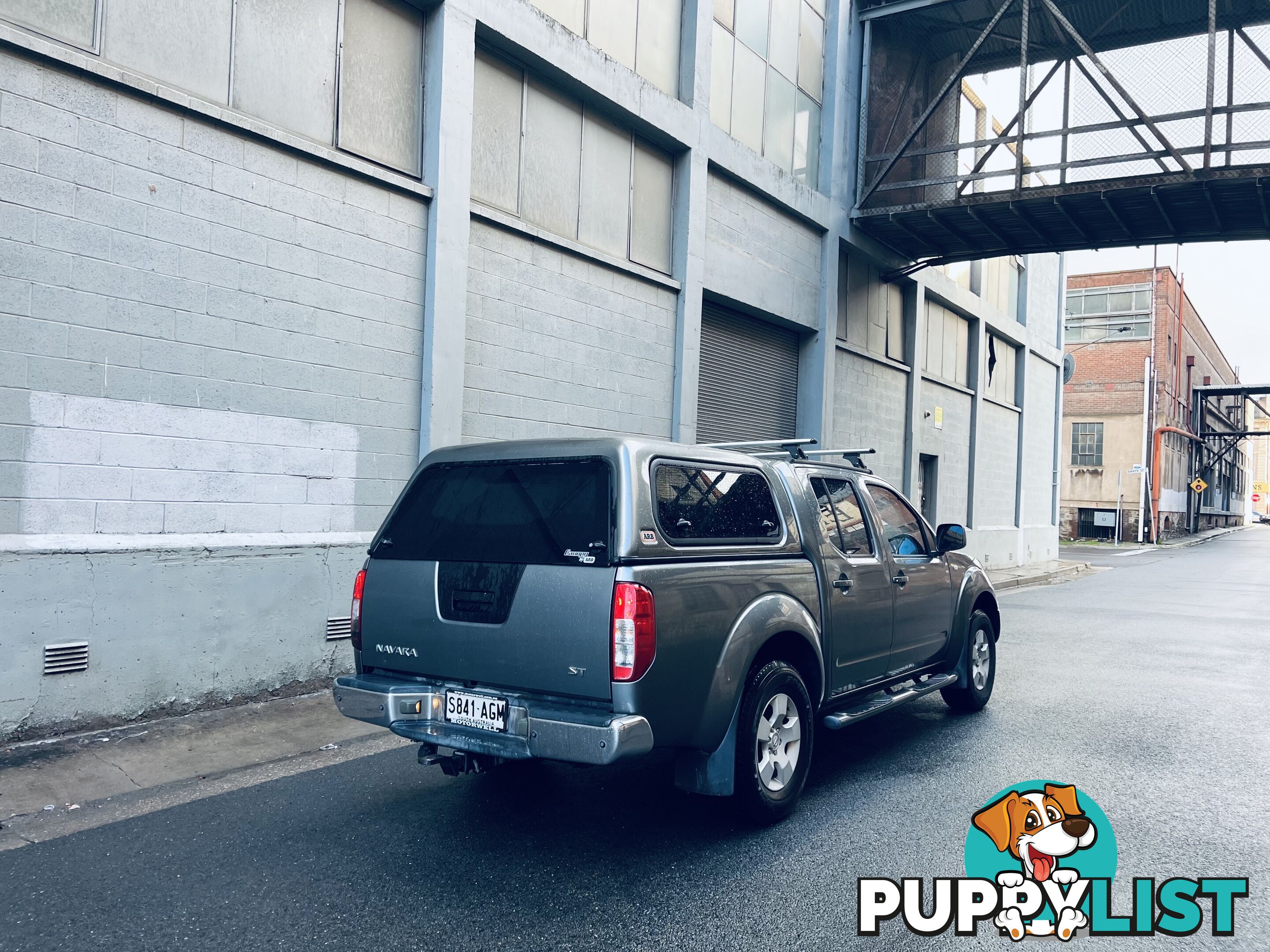 2010 NISSAN NAVARA ST (4x4) 5 SP AUTOMATIC DUAL CAB P/UP TURBO DIESEL