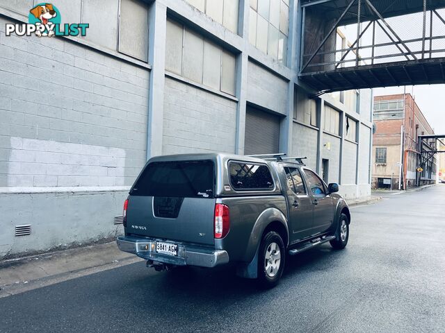 2010 NISSAN NAVARA ST (4x4) 5 SP AUTOMATIC DUAL CAB P/UP TURBO DIESEL