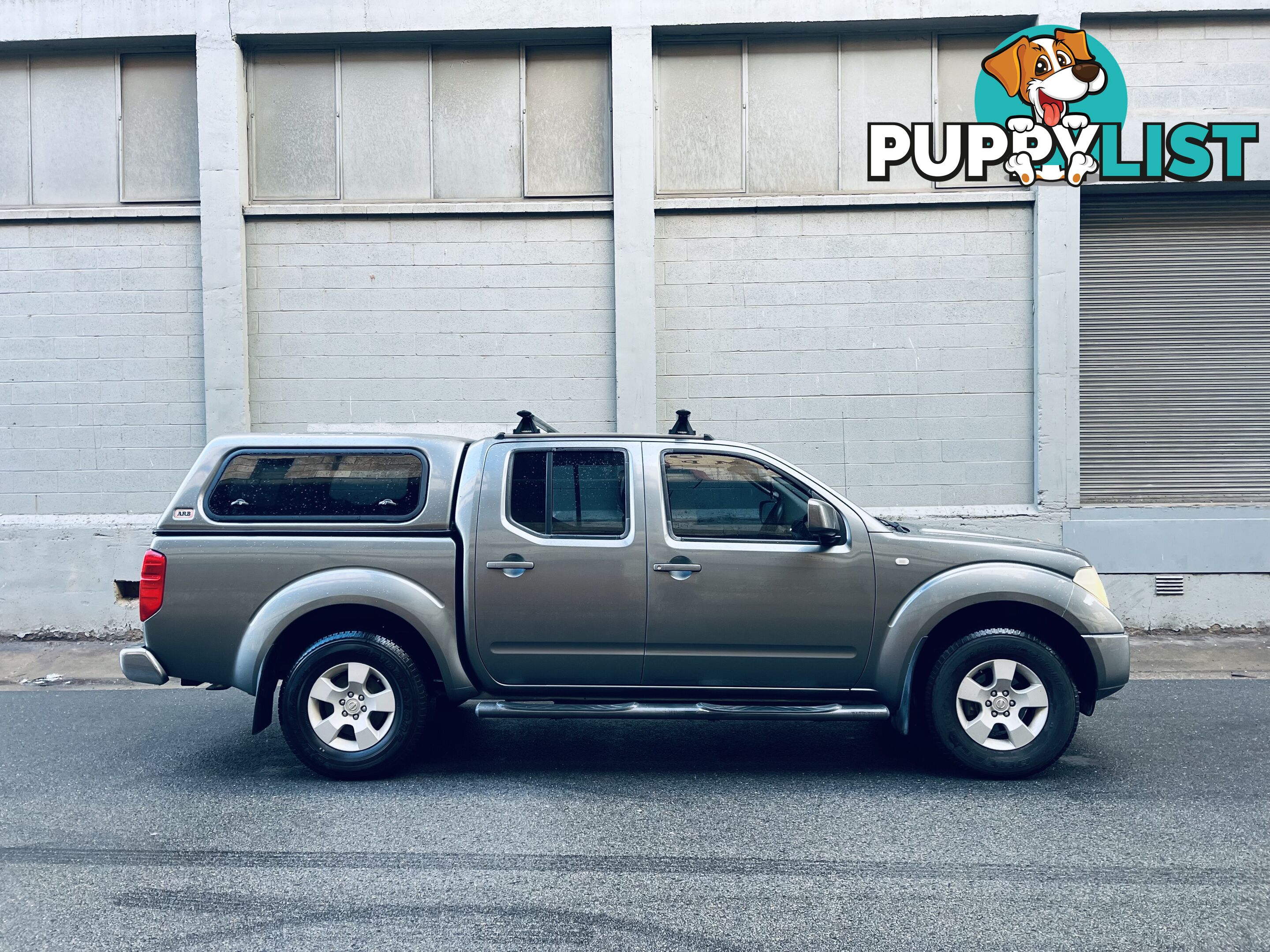 2010 NISSAN NAVARA ST (4x4) 5 SP AUTOMATIC DUAL CAB P/UP TURBO DIESEL