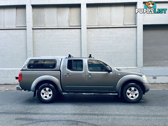 2010 NISSAN NAVARA ST (4x4) 5 SP AUTOMATIC DUAL CAB P/UP TURBO DIESEL