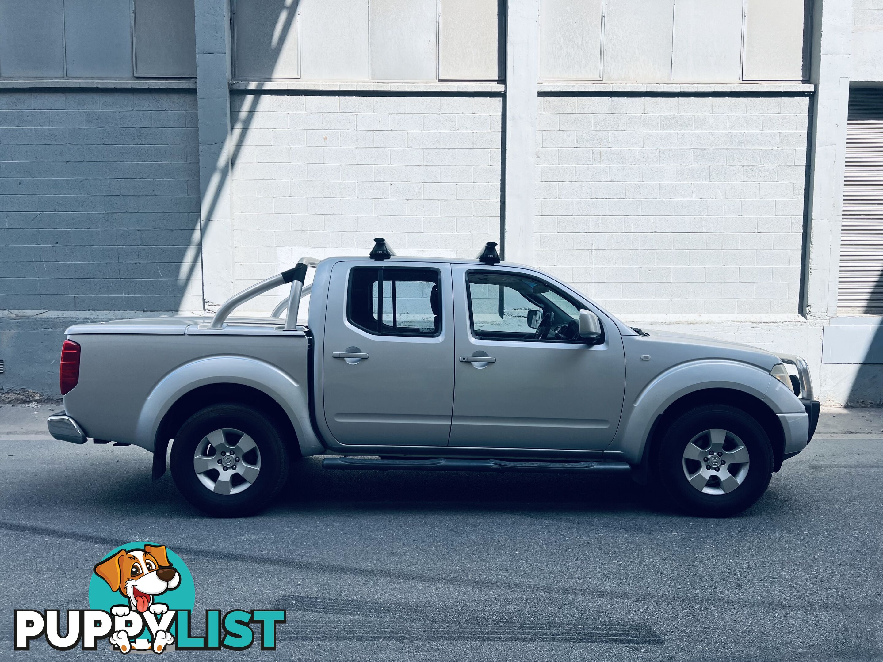 2010 Nissan Navara ST (4x4) Turbo Diesel Ute 5 Speed Automatic