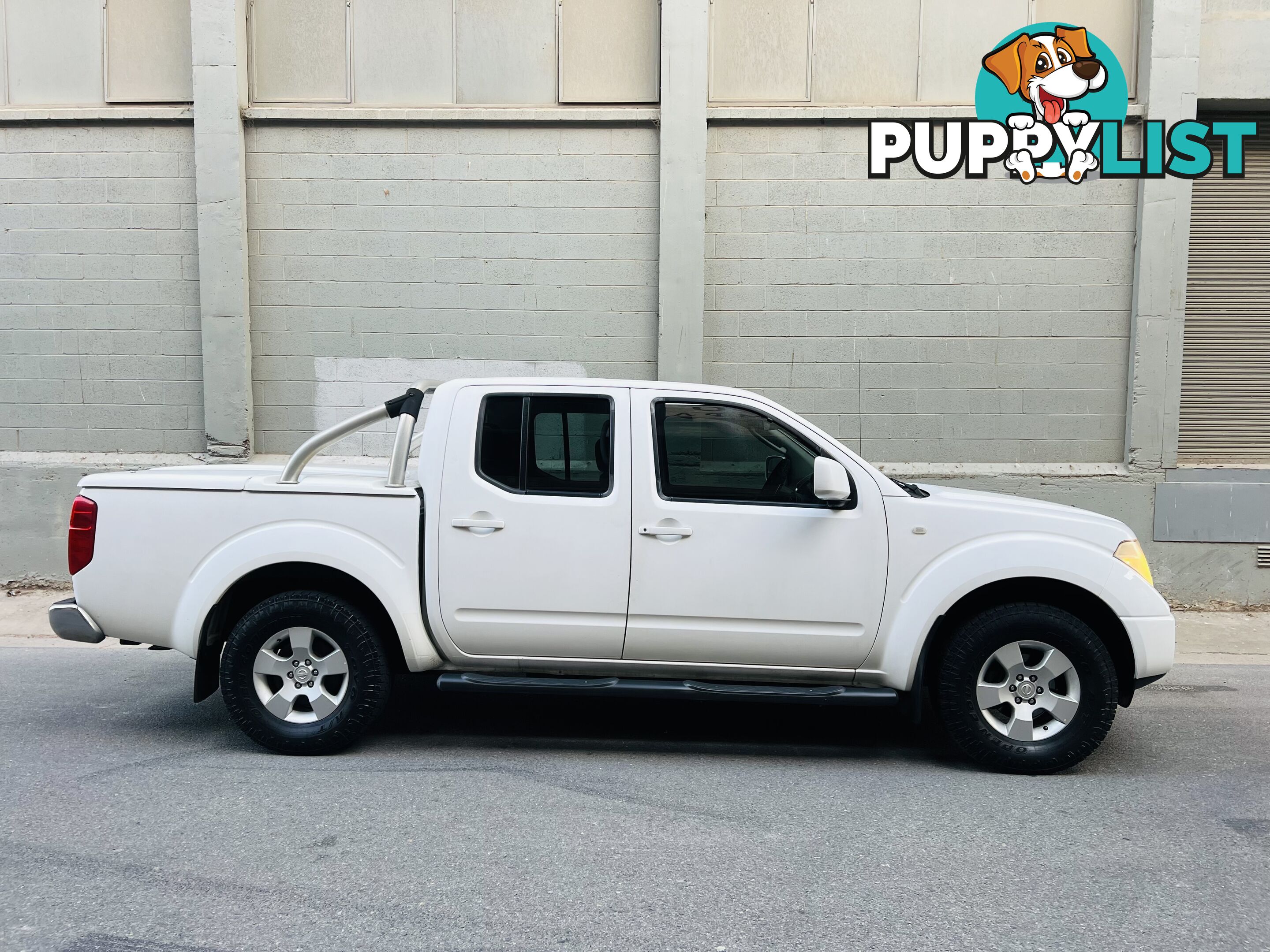 2010 NISSAN NAVARA ST (4x4) 5 SP AUTOMATIC DUAL CAB P/UP TURBO DIESEL