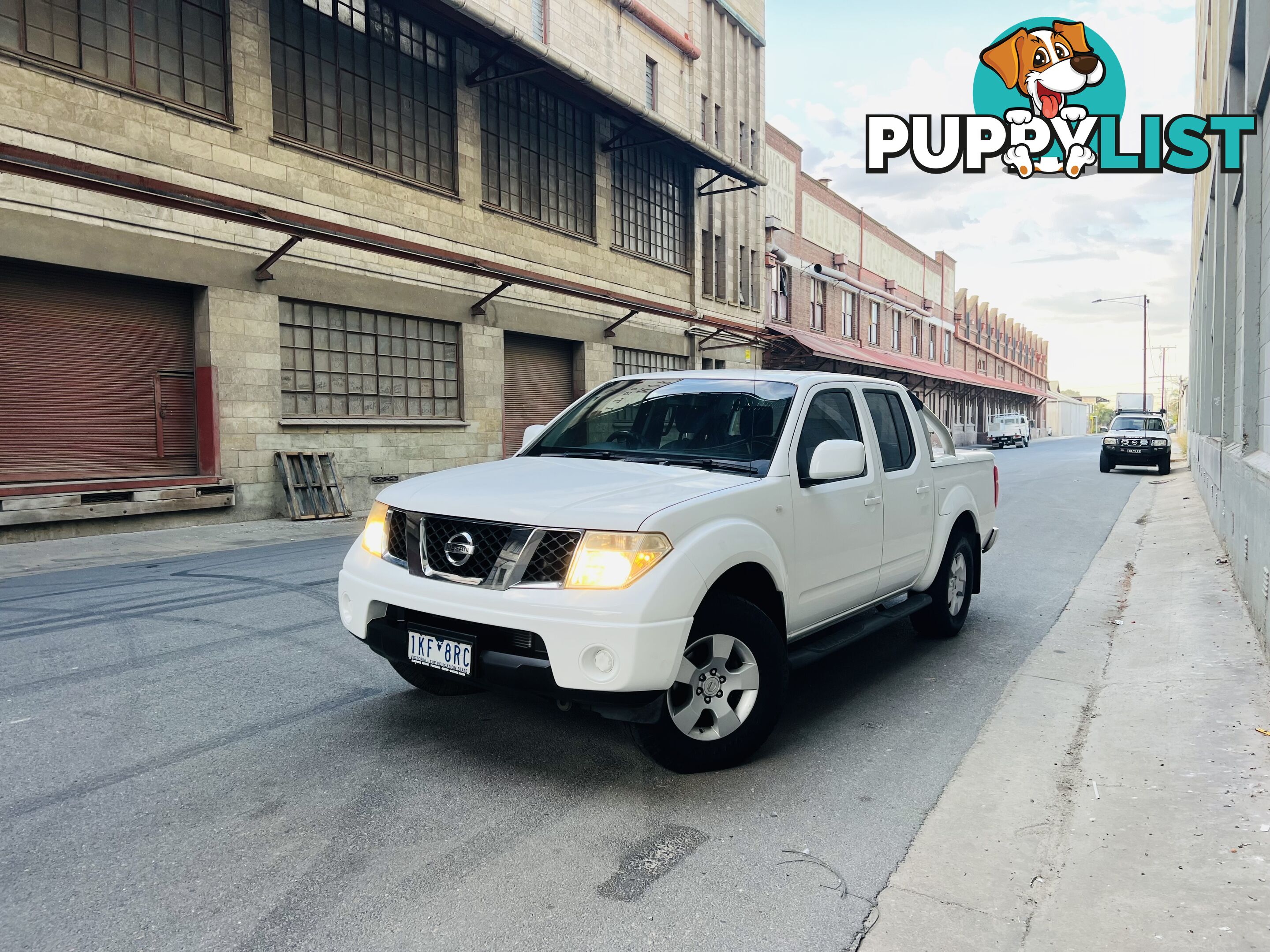 2010 NISSAN NAVARA ST (4x4) 5 SP AUTOMATIC DUAL CAB P/UP TURBO DIESEL