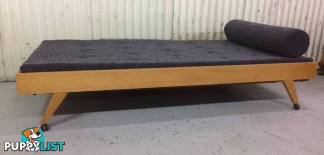 Vintage day bed very good condition. New mattress & upholstery.