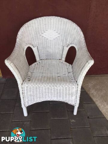 Wicker chair painted white. Needs painting. $20