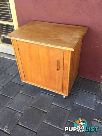 Vintage cabinet on castors single door. Bedside table